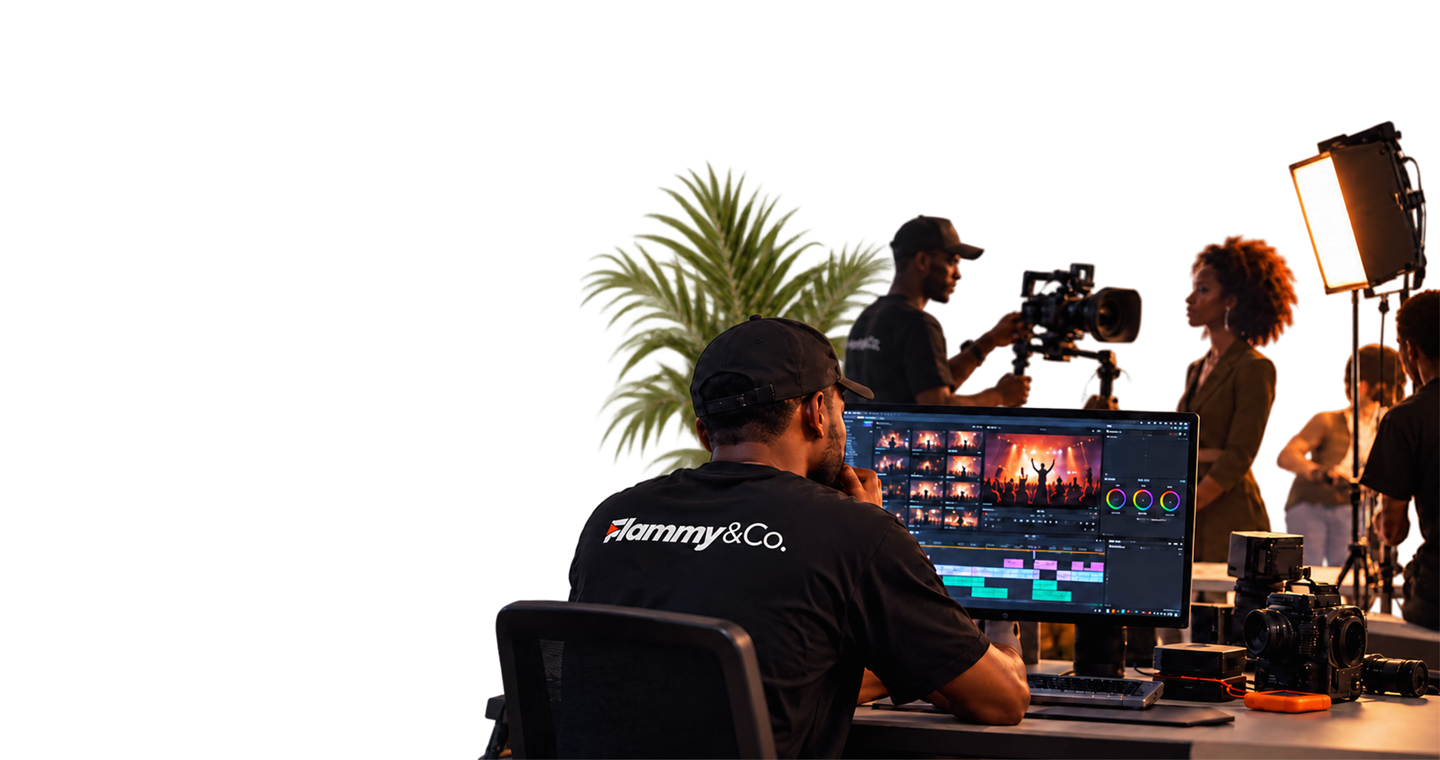A Flammy producer editing footage while a crew films on set